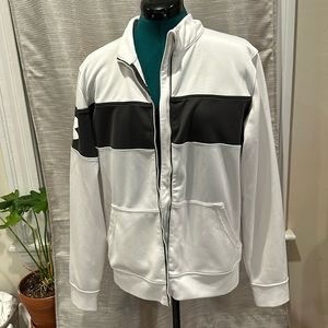 Under Armour semi fitted all season running jacket. Gray and white. L